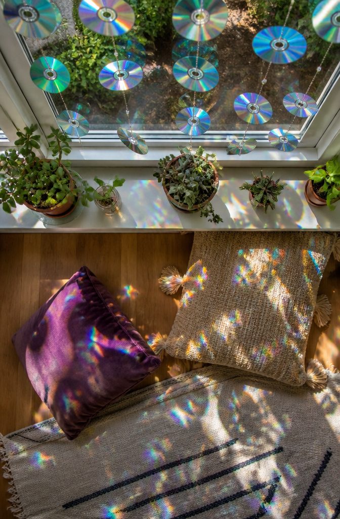20 Cool Stuff to Make for Your Room in 2026: DIY Ideas 12 Hanging CDs painted and arranged to catch sunlight.