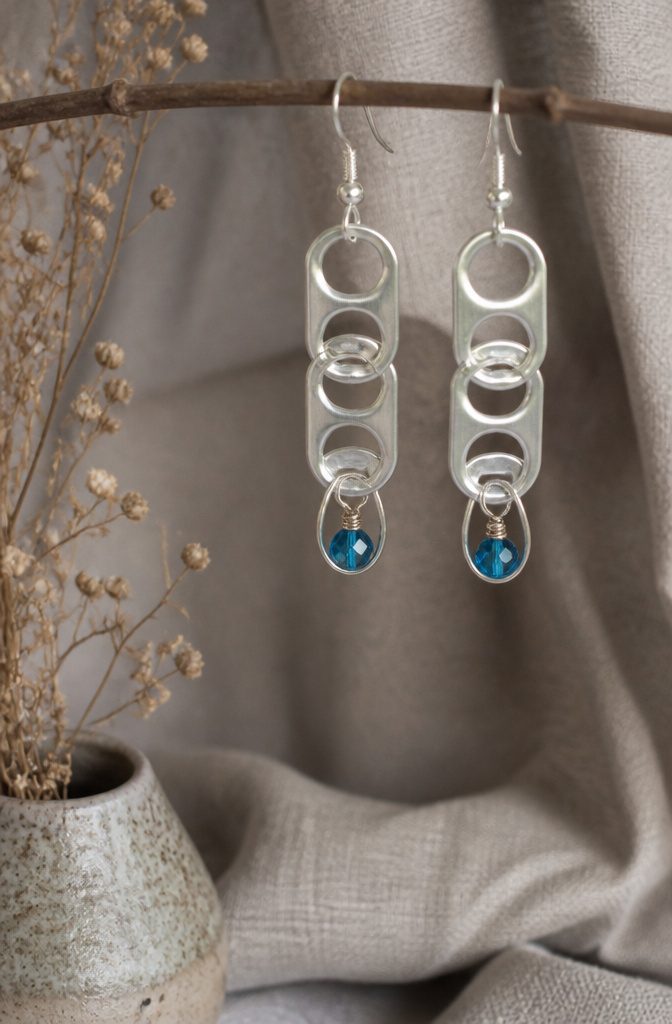 20 Crafts to Do With Soda Tabs: Easy Pop Tab Ideas 3 A pair of earrings made from aluminum soda tabs and beads.