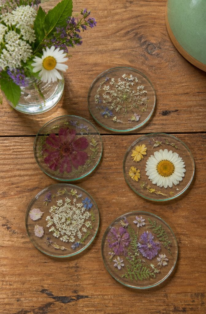 How to Make DIY Homemade Crafts: 16 Easy Project Ideas 10 Coasters with pressed flowers displayed on a coffee table.