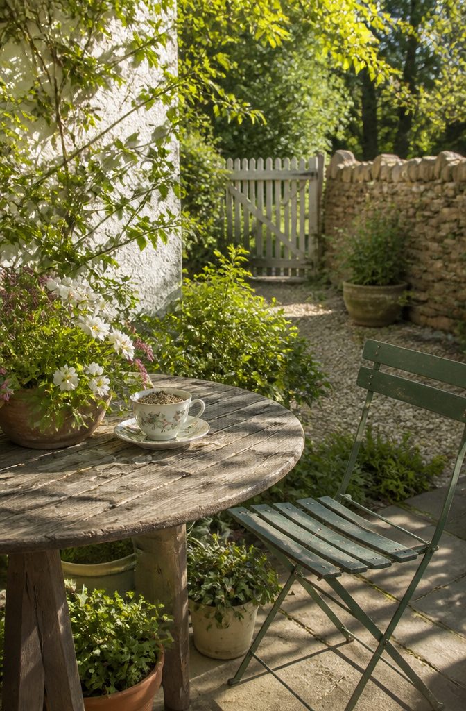 How to Make DIY Homemade Crafts: 16 Easy Project Ideas 15 Teacup bird feeder placed on a saucer, filled with bird seeds.