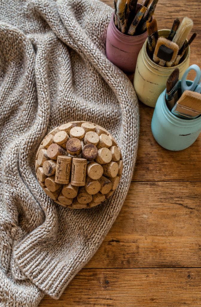 How to Make DIY Homemade Crafts: 16 Easy Project Ideas 20 An old sweater displayed with ideas for upcycling into new crafts.