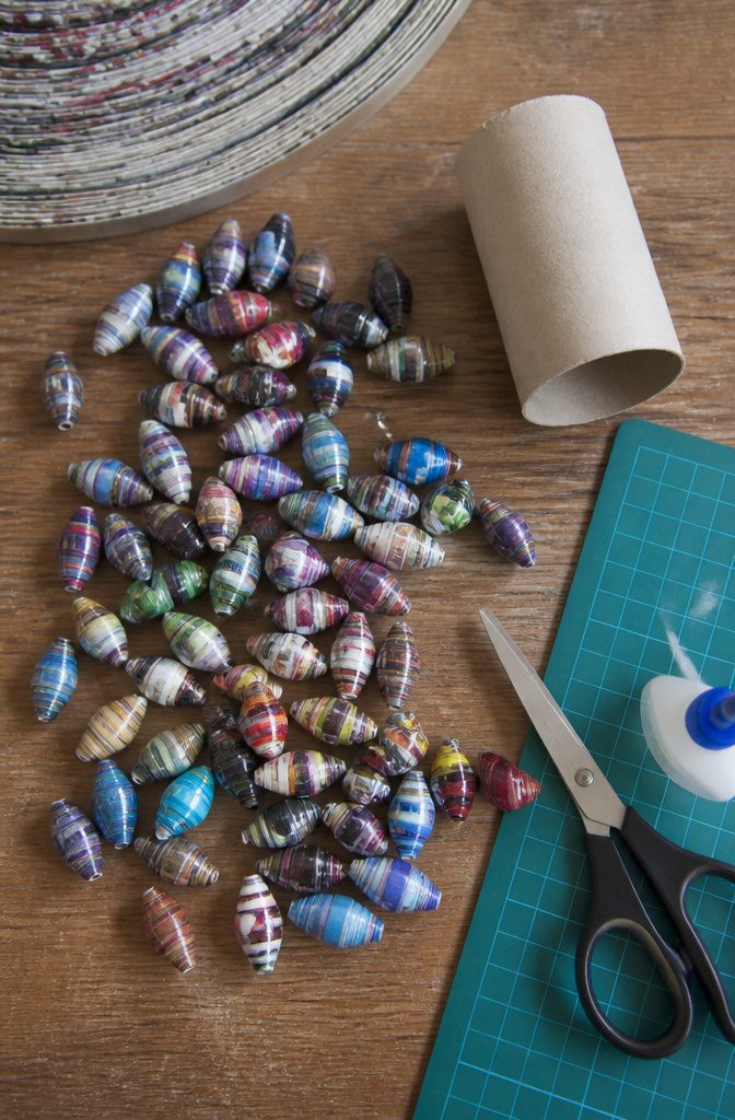 Recycled materials like magazines and toilet paper rolls for DIY projects.