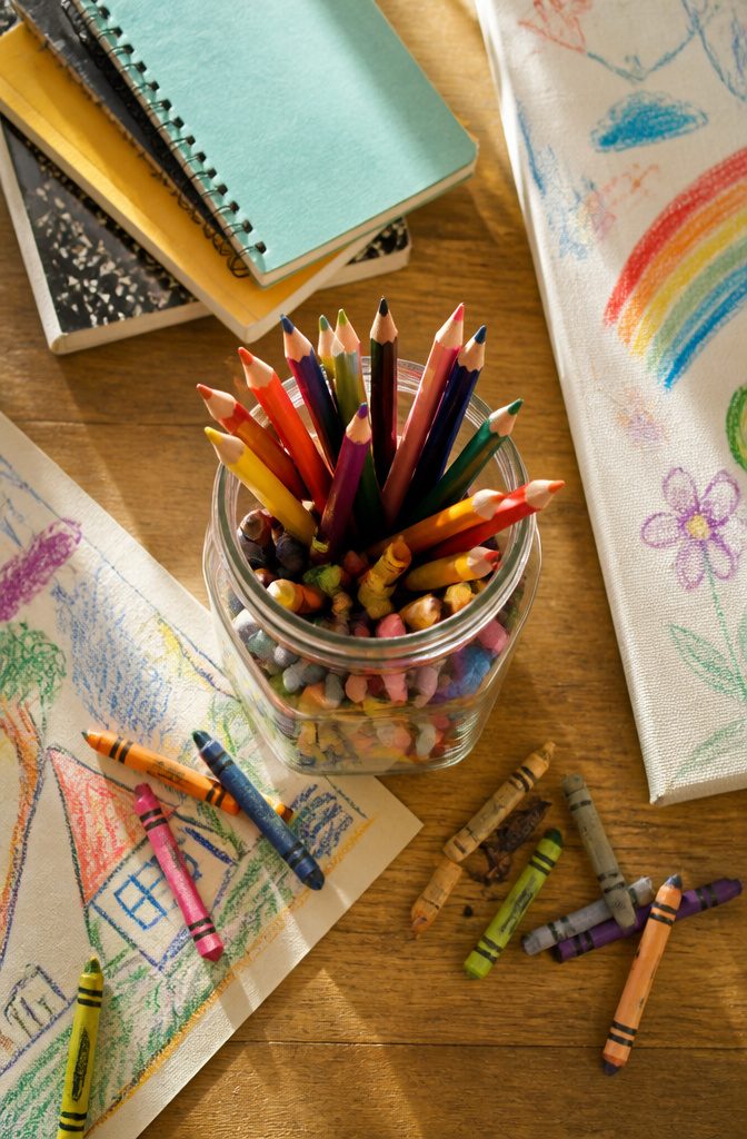 How to Reuse Glass Jars: 10 Practical Ways to Give Them New Life 7 Various small items stored in clear glass jars on a desk.