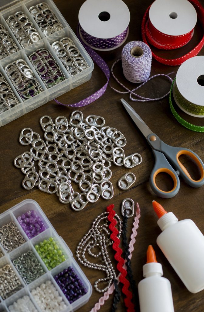 Pop Tab Crafts: Upcycled Projects Made From Soda Can Tabs 22 Supplies needed for crafting with pop tabs.