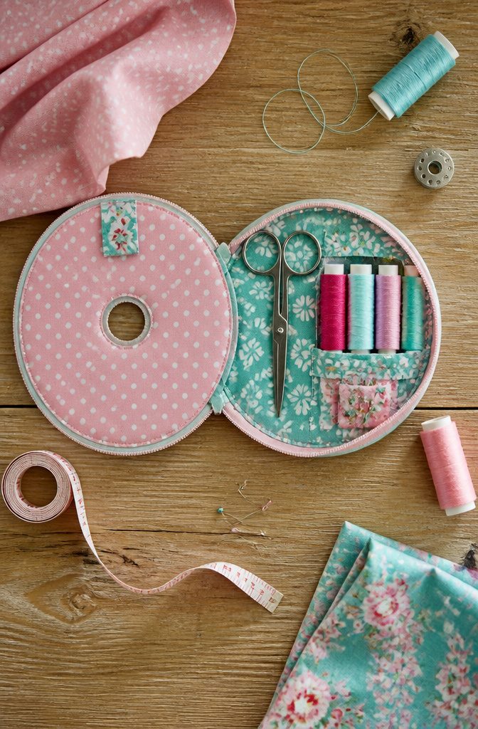 22 DIY Things to Do With CDs: Ideas for Old Discs 19 A CD covered with fabric, used as a mini sewing kit.