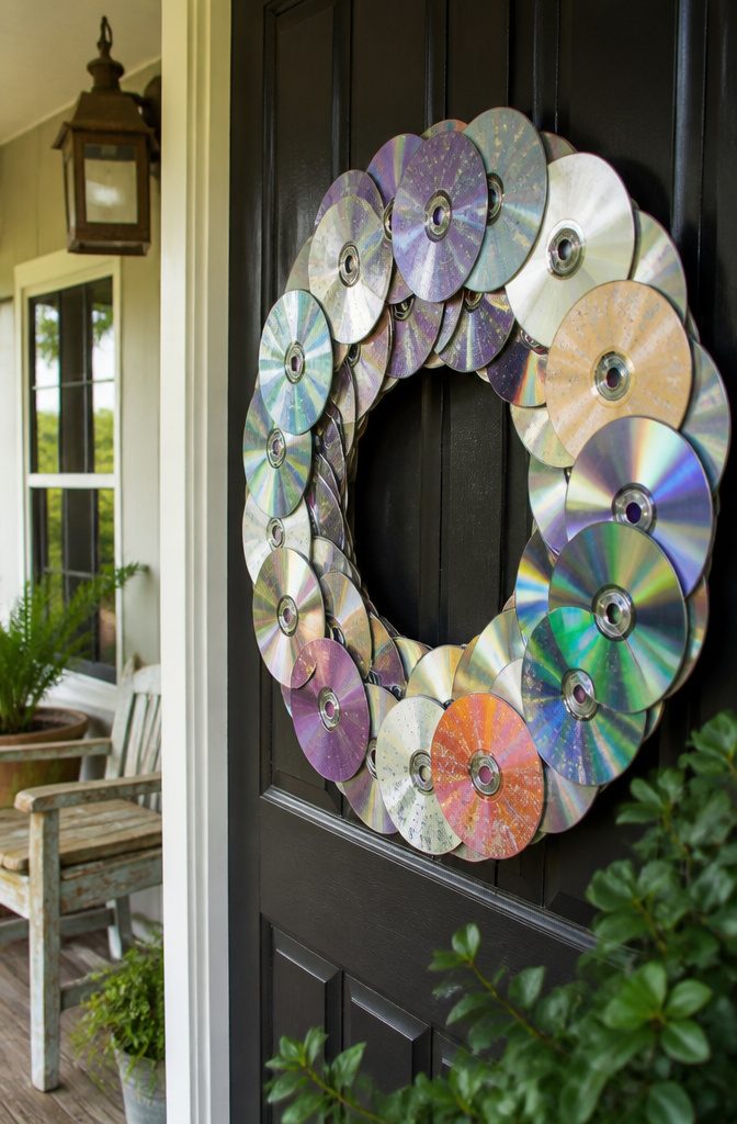 22 DIY Things to Do With CDs: Ideas for Old Discs 17 A decorative wreath made from overlapping CDs.