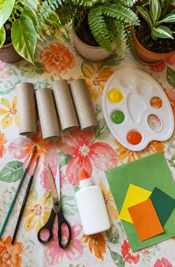 Toilet Paper Bird Craft: 4 Steps to Make a Roll Bird (2026) 2 Materials needed for a toilet paper bird craft, including paint and cardboard.
